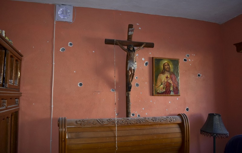  Parede de uma das casas da vizinhança em área de confronto no México — Foto: Gerardo Sanchez/AP 