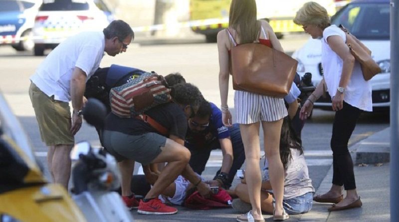 x71110864_A-person-is-treated-in-Barcelona-Spain-Thursday-Aug-17-2017-after-a-white-van-jumped-the-si.jpg.pagespeed.ic.EMU3CLpuFb