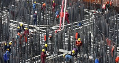 NANTONG, CHINA - NOVEMBER 08: Construction workers cast concrerte on the bearing platform of main piers of Hutong Yangtze River Bridge on November 8, 2017 in Nantong, Jiangsu Province of China. The 11,072-meter-long Hutong Yangtze River Bridge started construction in March 2014, spanning 1,092 meters on the south side and 336 meters on the north. As the world's longest cable-stayed bridge, it has a design that allows dual-use, with rails on the lower layer and a highway on the top. It will only take about one hour traveling from Shanghai to Nantong after its completion. (Photo by VCG/VCG via Getty Images)