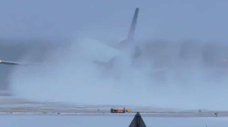 avião aterriza e desaparece em nuvem de neve