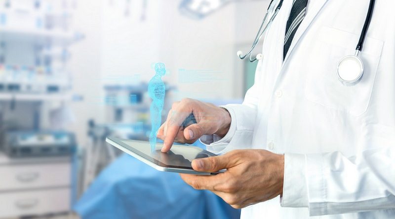 Smart health care internet of things and hospital automation management , Artificial intelligence hologram robot adviser technology concept. Doctor with Stethoscope using tablet for remote monitoring.