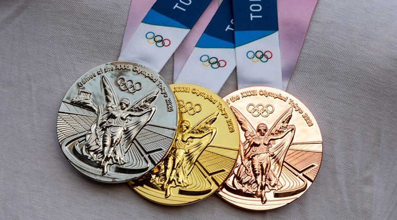 April 17, 2021 Tokyo, Japan. Gold, silver and bronze medals of the XXXII Summer Olympic Games in Tokyo on the chest of the athlete.