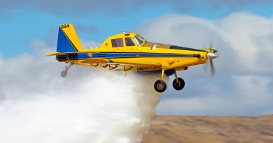 Rowland Flat, Australia - April 14, 2013: Air Tractor 802 agricultural and fire bombing aircraft VH-ODH dropping a load of water.