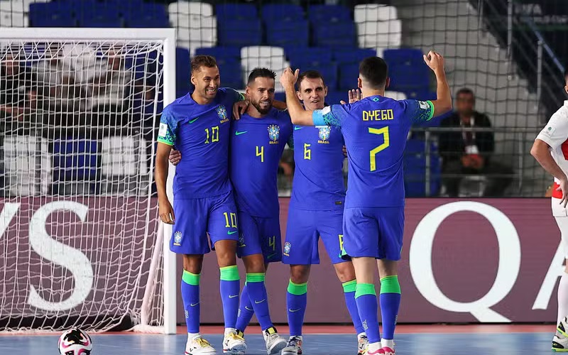 Marcel comemora gol do Brasil na Copa do Mundo de Futsal — Foto: Getty Images